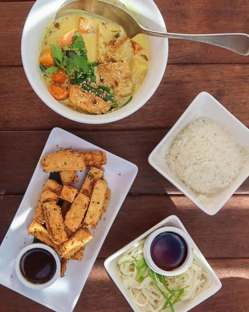 Overhead shot of four Asian-inspired dishes from Wellington restaurant Chow