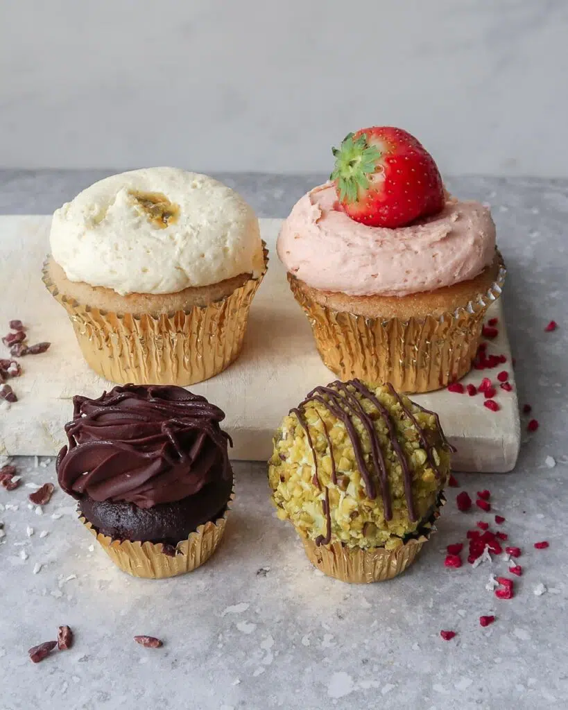 Set of four large and four small cupcakes from Lola's Bakery