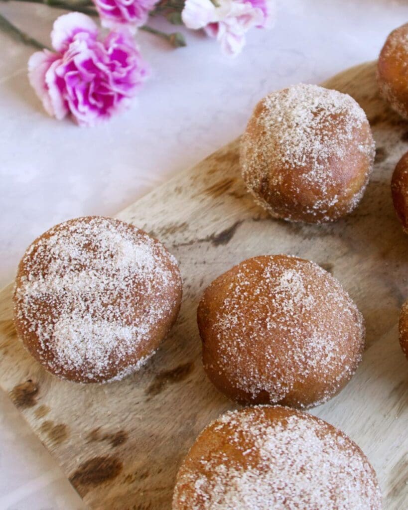 Mini doughnuts on a wooden board