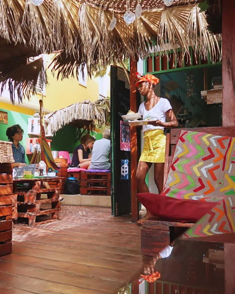 Waitress in a colourful restaurant in Cape Verde
