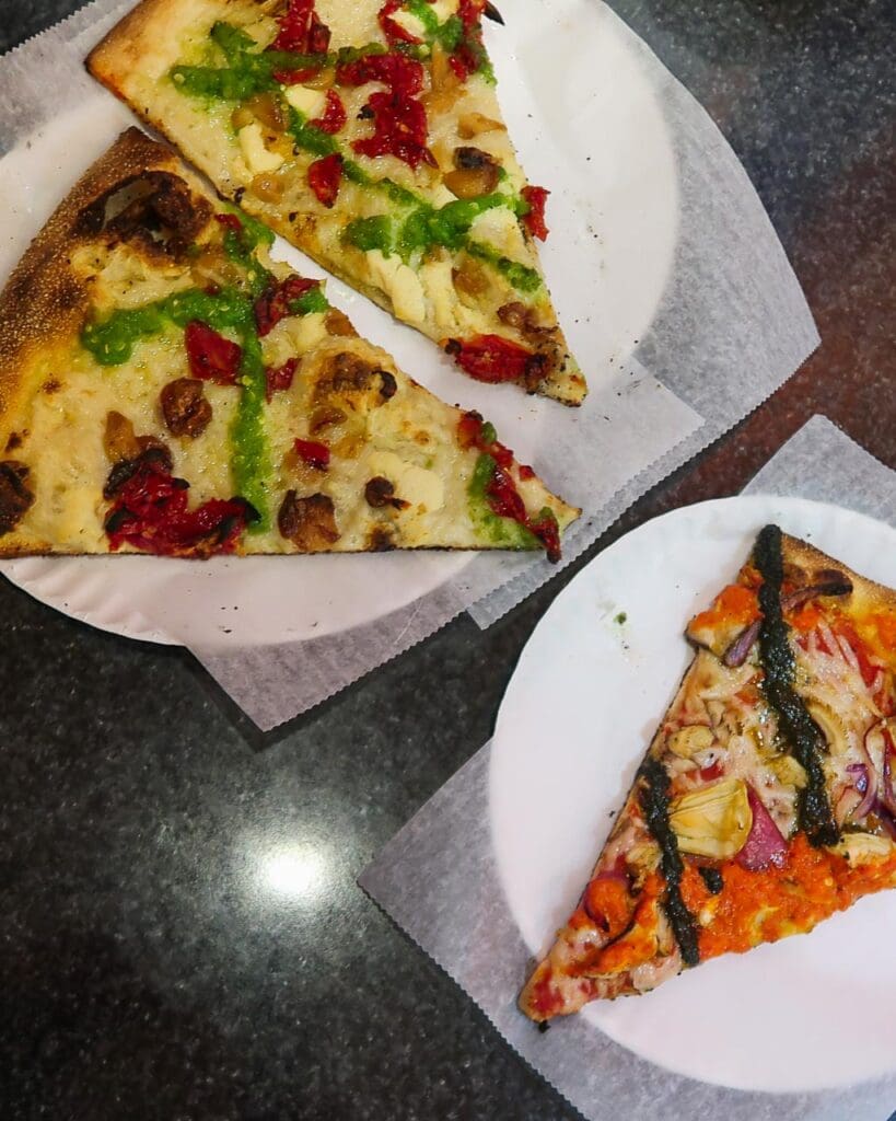 Three slices of vegan pizza from Two Boots in New York City