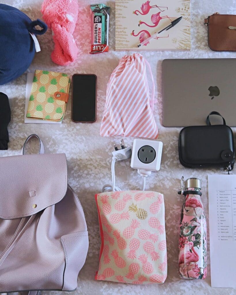 Travel essentials laid out ready to be packed