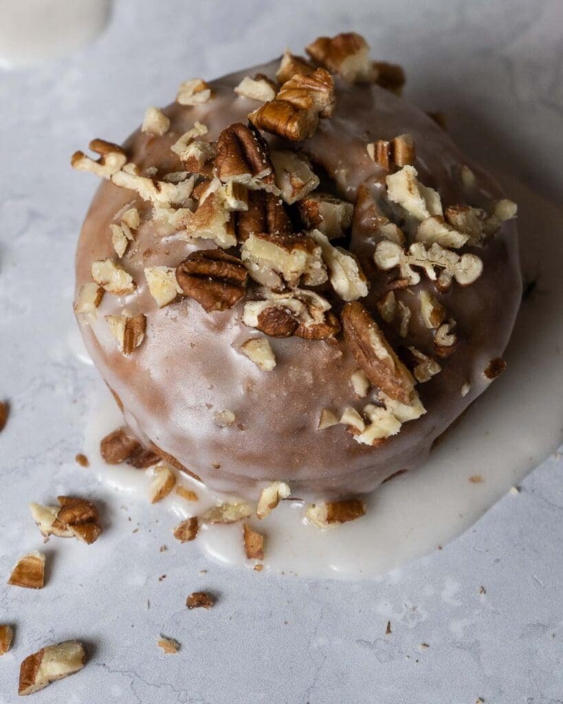 Baked banana bread doughnuts with a icing glaze
