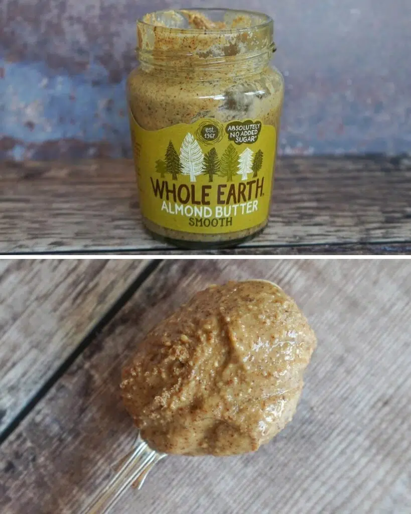 A jar of Whole Earth Almond Butter and a spoonful showing the consistency