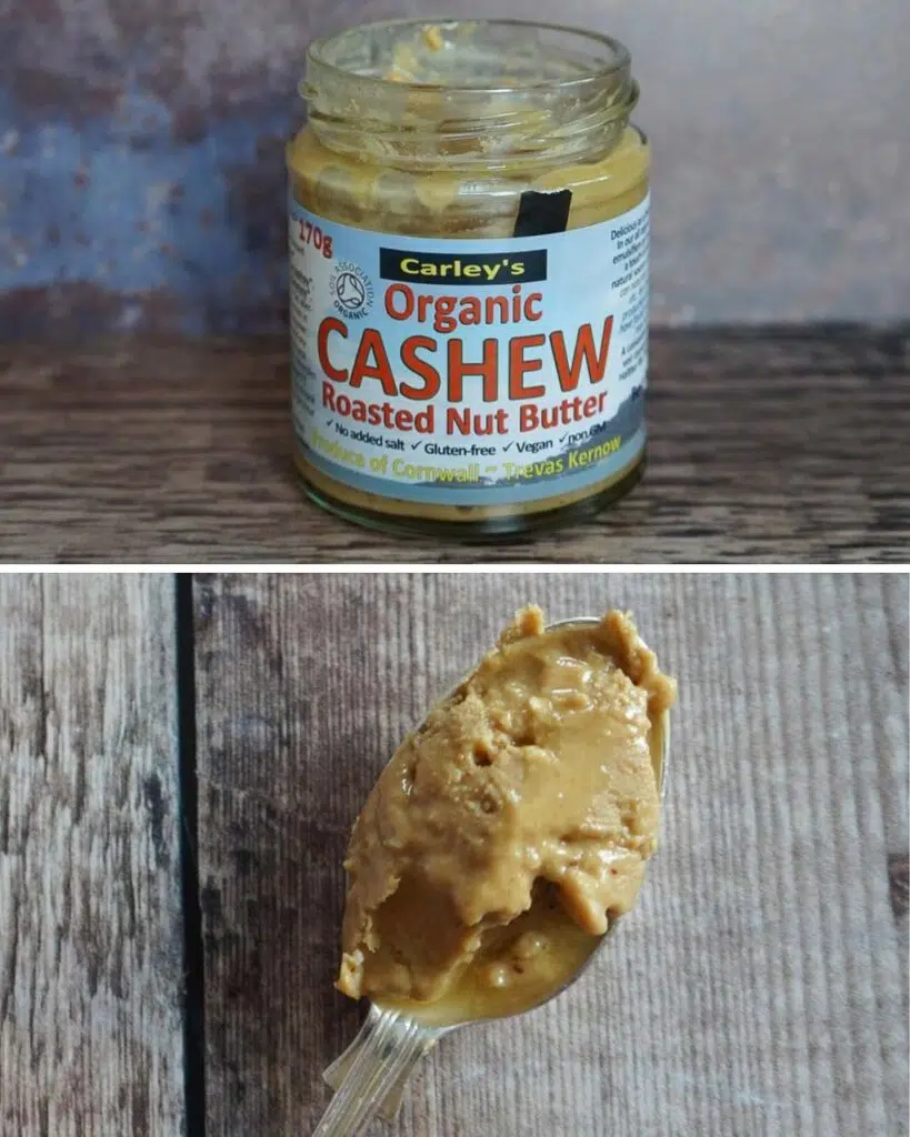 A jar of Carley's Cashew Butter and a spoonful showing the consistency