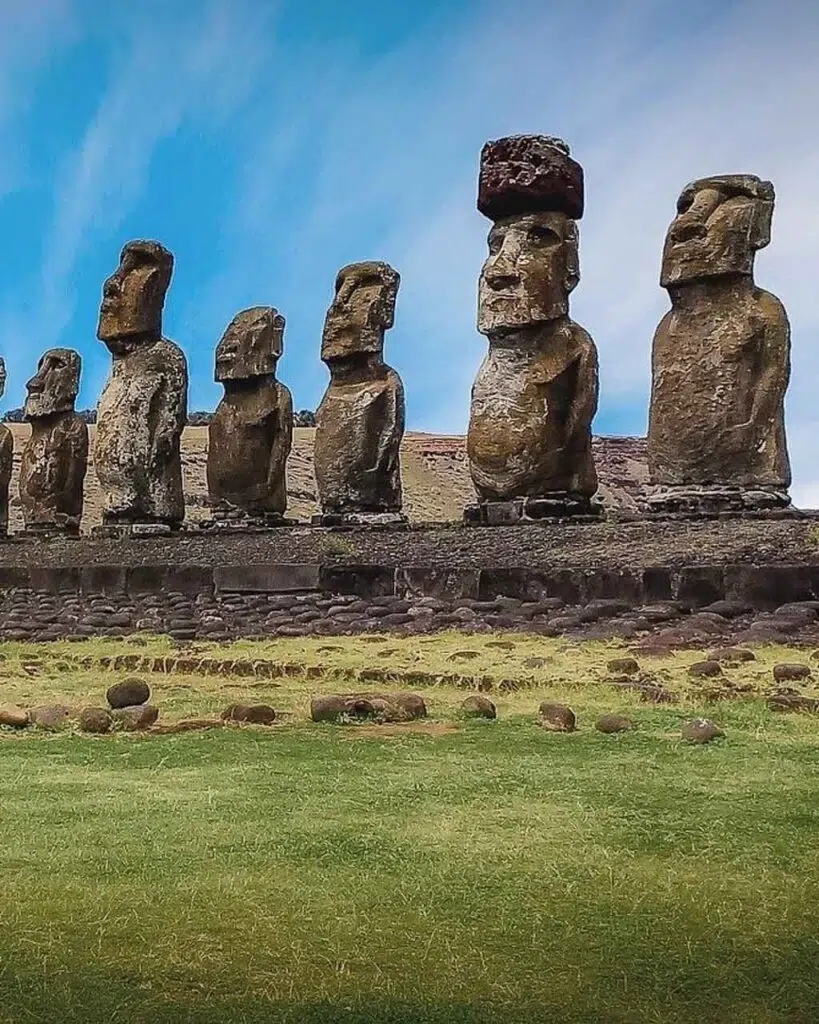 A row of moai stone heads standing up on Easter Island