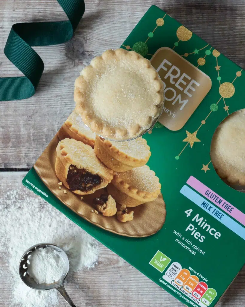 A festive green box of Sainsbury's vegan mince pies, crimped at the edges
