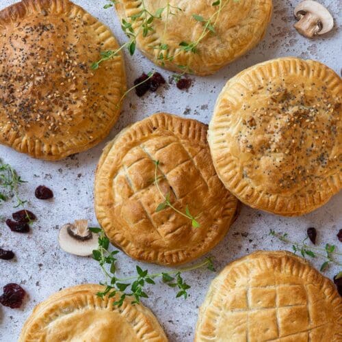 Top down view of vegan puff pastry pies filled with a mushroom and thyme filling