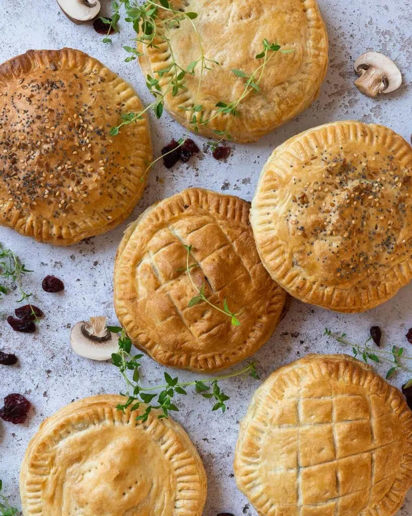 Top down view of vegan puff pastry pies filled with a mushroom and thyme filling