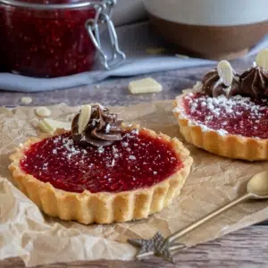 Raspberry Jam Tartlets with Almond Pastry and Chocolate Cream 3 Sq