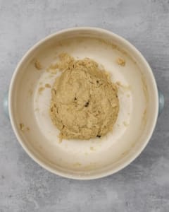 A process shot of making vegan welsh cakes, with the ingredients brought together into a ball of dough