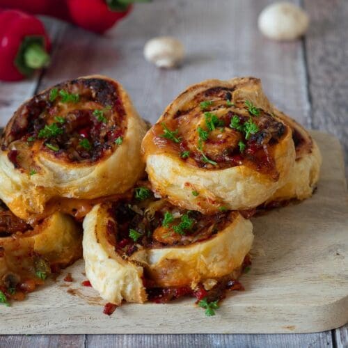Spirals of puff pastry filled with spicy Mexican veggies and sprinkled with fresh herbs.
