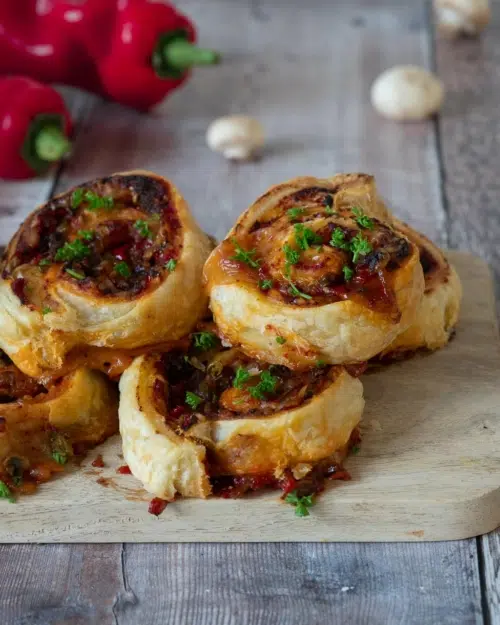 Spirals of puff pastry filled with spicy Mexican veggies and sprinkled with fresh herbs.