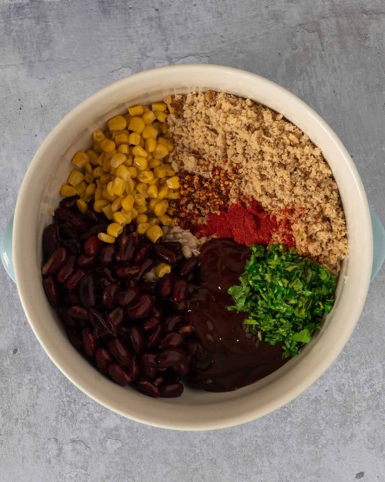 The ingredients for making BBQ bean burgers in a bowl