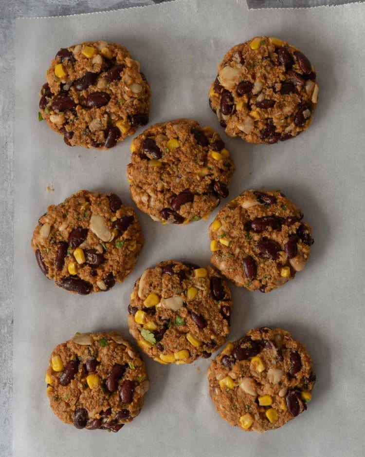 BBQ bean burger patties ready to be coated in breadcrumbs
