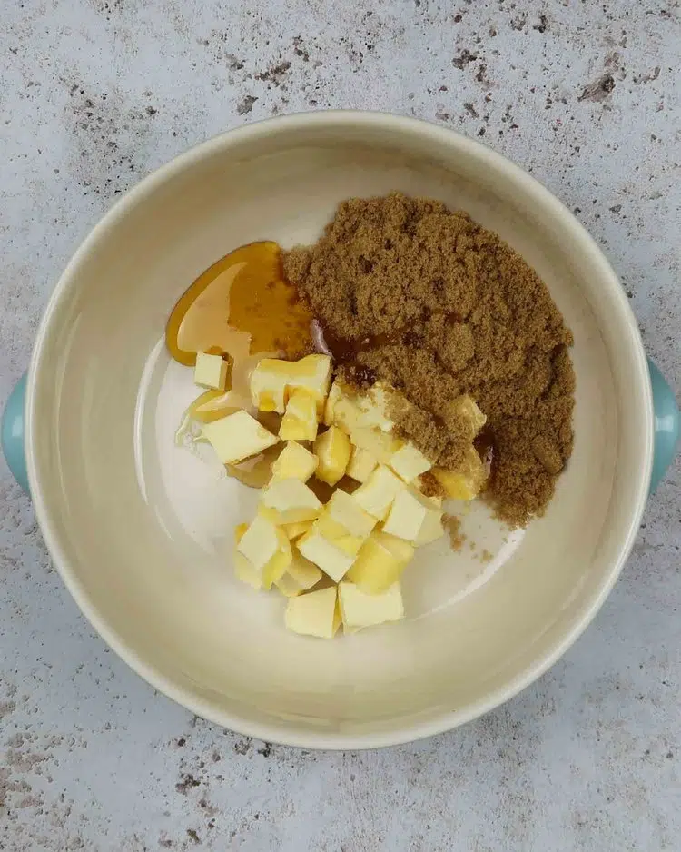 Sugar, syrup and cubes of butter in a mixing bowl