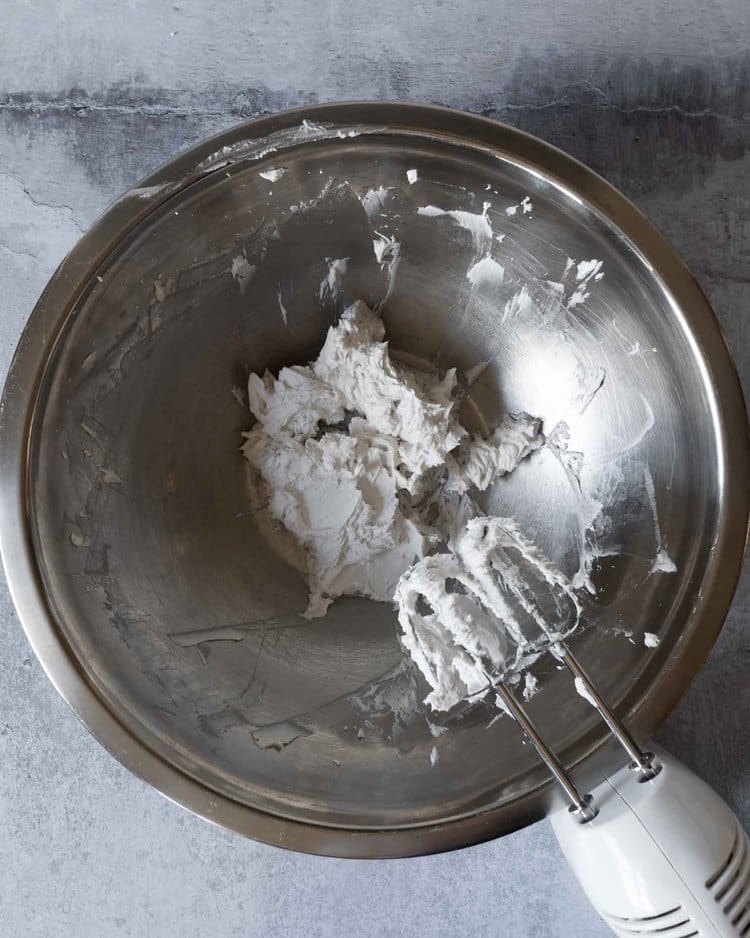 Coconut cream being whipped to stiff peaks