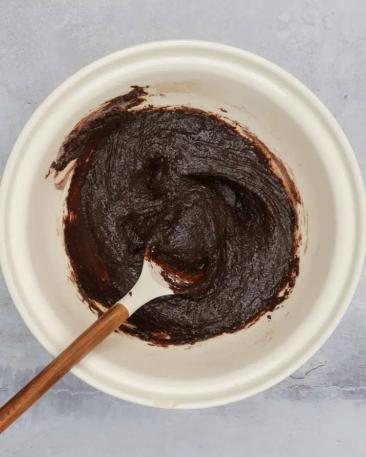 Vegan brownie cake batter in a large mixing bowl