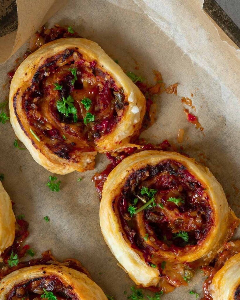 Spirals of puff pastry filled with spicy Mexican veggies and sprinkled with fresh herbs.