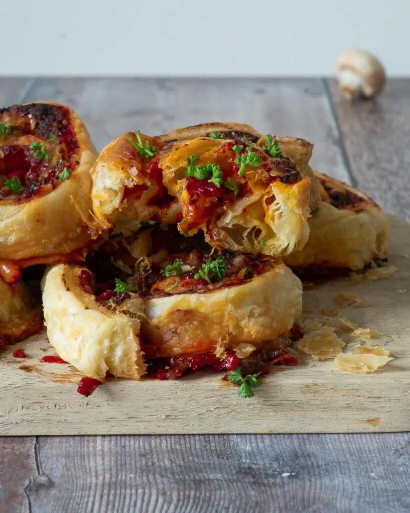 Spirals of puff pastry filled with spicy Mexican veggies and sprinkled with fresh herbs.