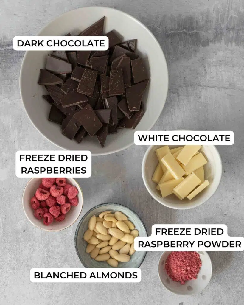 The ingredients needed to make raspberry triple chocolate bark