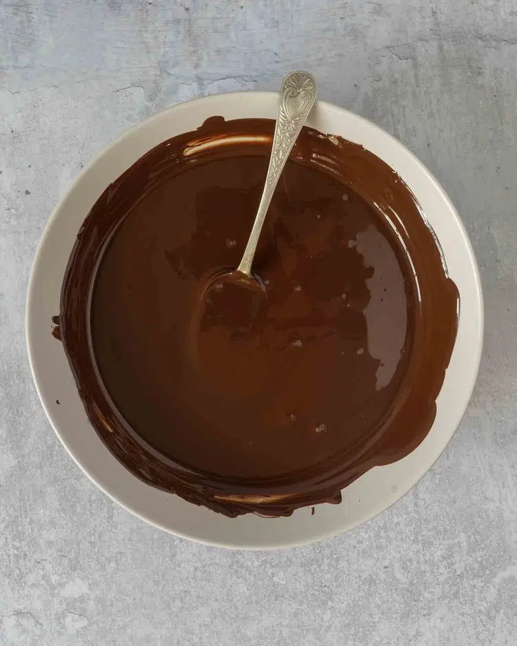 Melted dark chocolate in a bowl