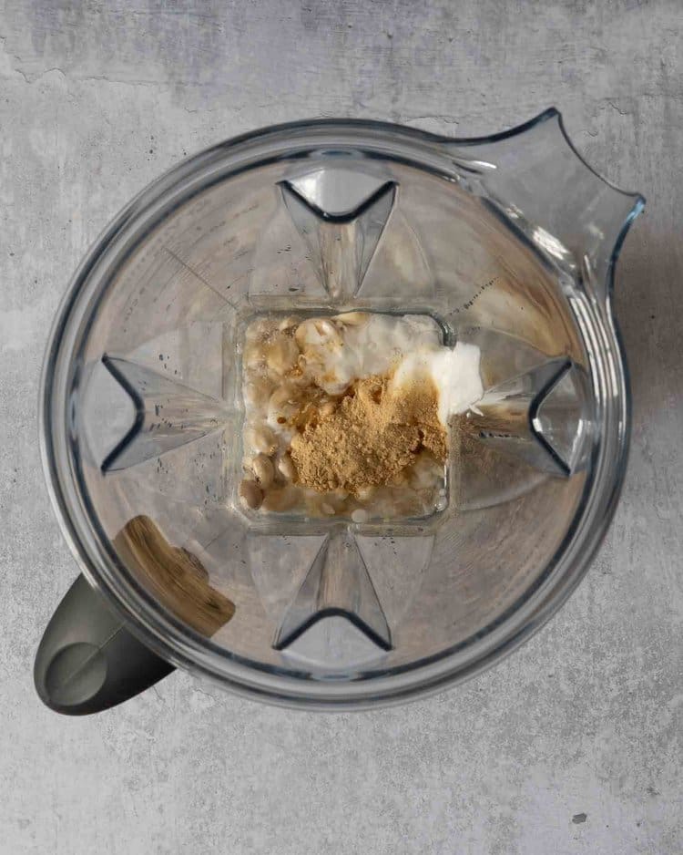 Ingredients in a blender ready to be made into a vegan cheesecake filling