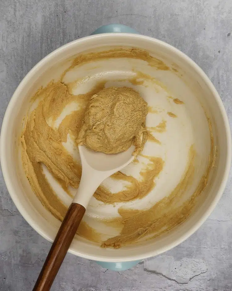 Creamed sugar and vegan butter in a bowl