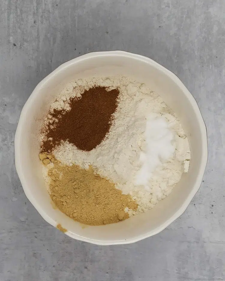 Gingerbread spices in a bowl ready to be mixed