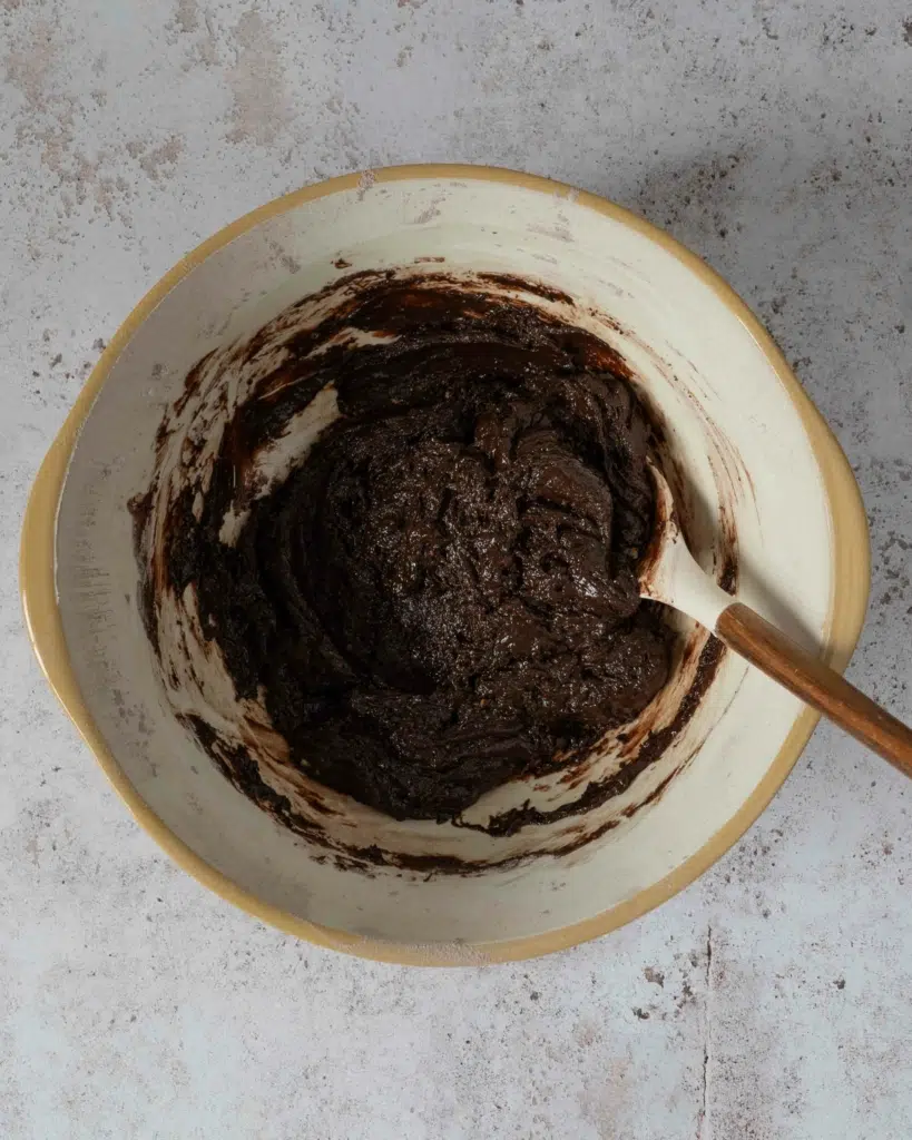 Chocolate fudge mixture in a mixing bowl