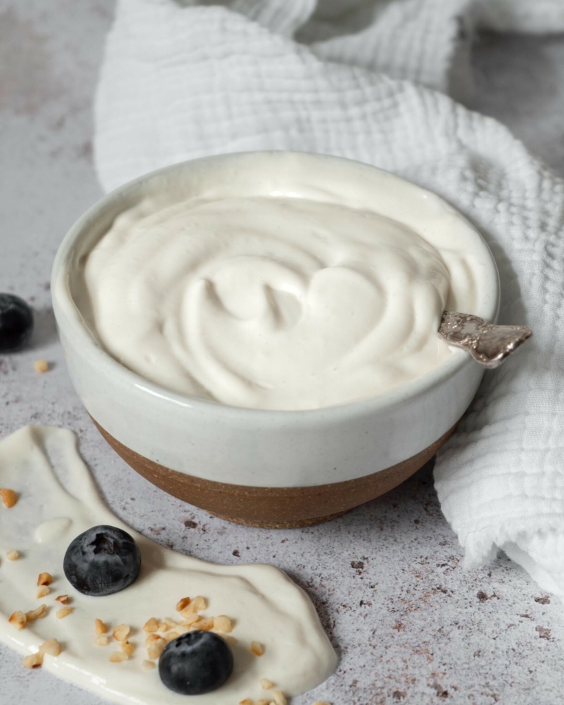 Creamy vegan tofu mascarpone in a rustic bowl