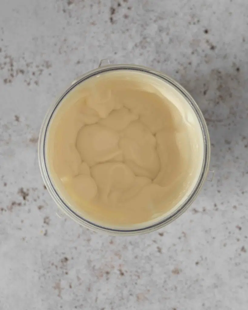 Vegan mascarpone in a blender cup, having been freshly made