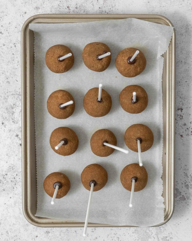 A tray of tiramisu cake pops, ready to be coated in chocolate