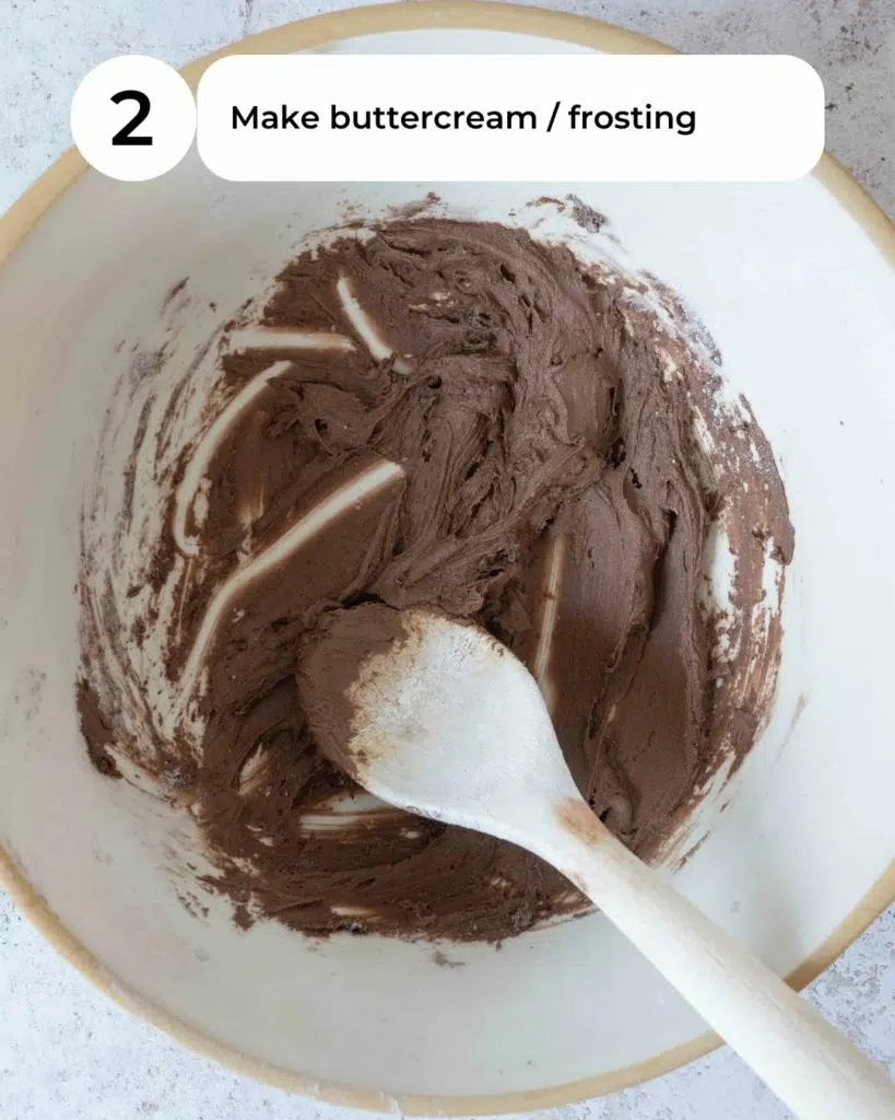 Chocolate buttercream in a large mixing bowl.