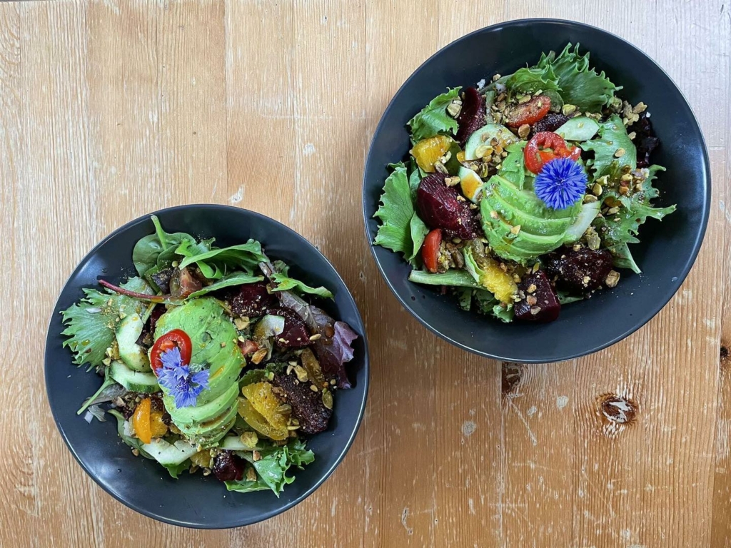 Colourful vegan salads with avocado