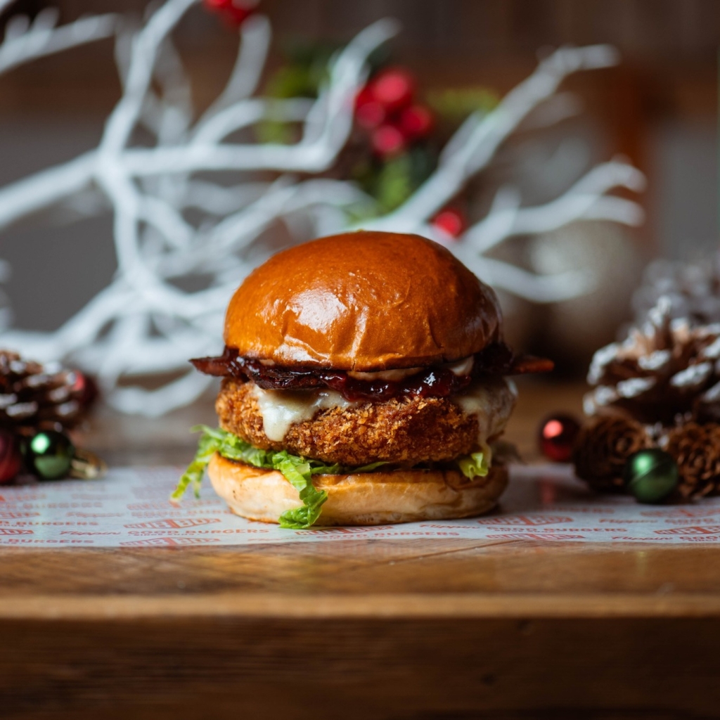 A stacked vegan Christmas burger