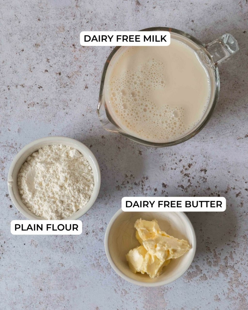 The ingredients needed to make vegan bechamel sauce with oat milk