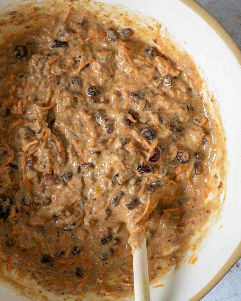 Carrot cake batter in a large mixing bowl