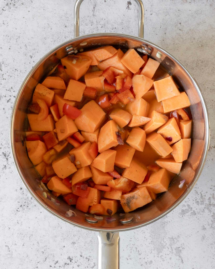 Cubes of sweet potato in a saucepan