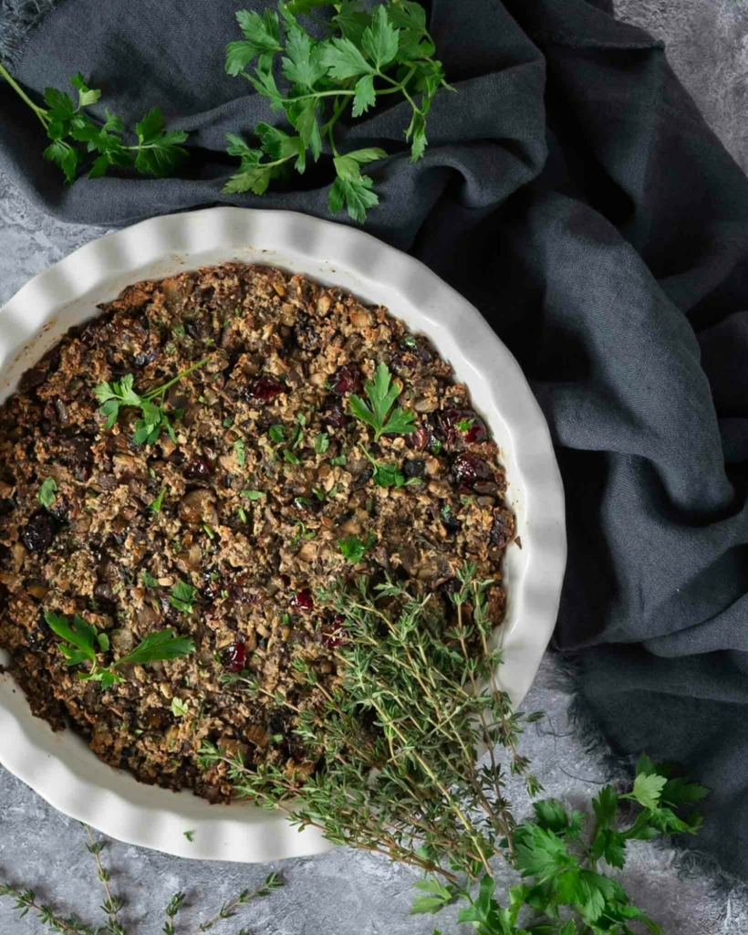 A baking dish filled with flavoursome vegan chestnut stuffing