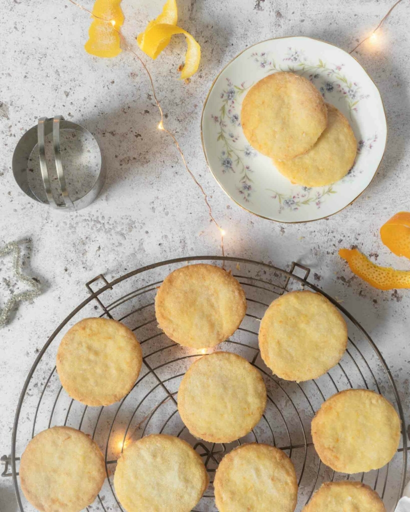 Vegan lemon shortbread cookies on a cooling rack