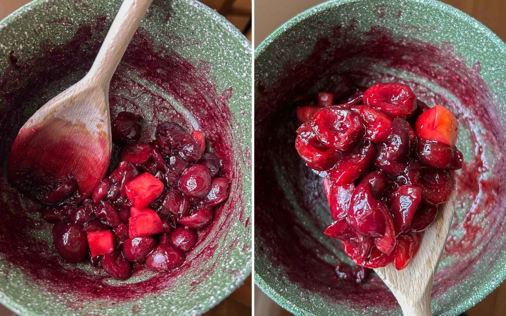 Apples and cherries in a saucepan being cooked