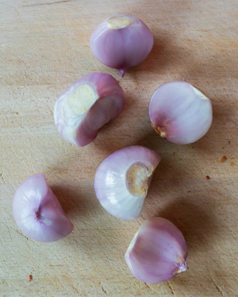 Peeled shallots broken up into cloves