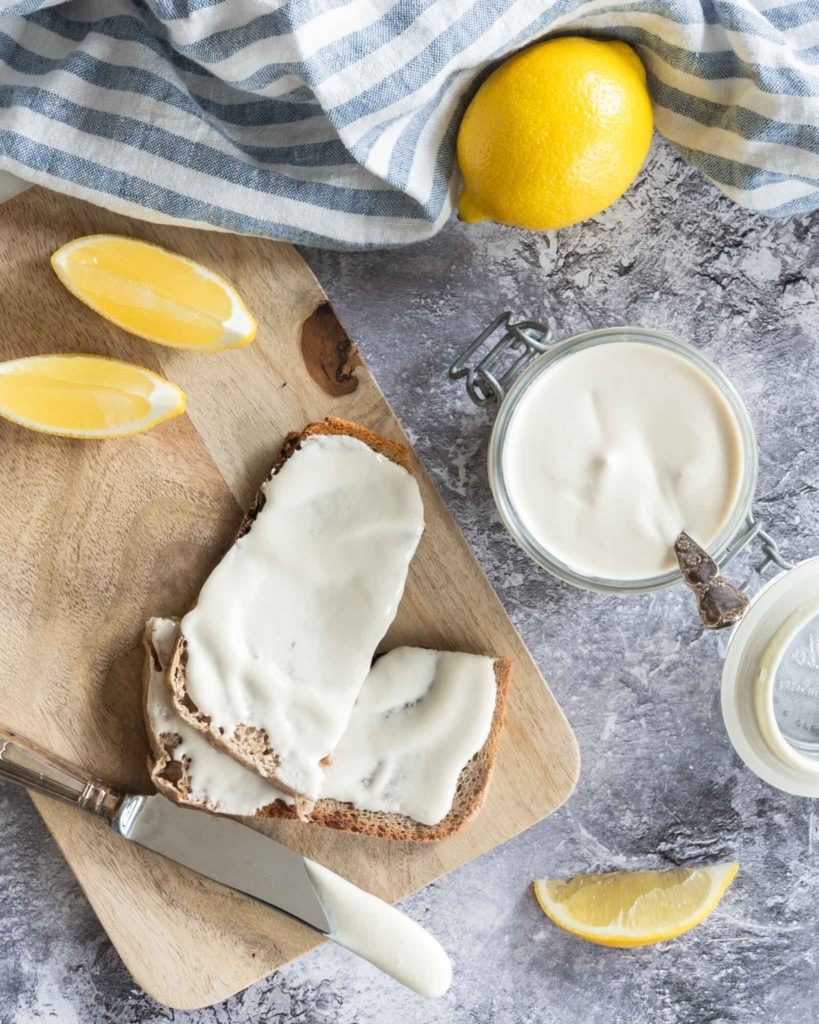 Vegan mayonnaise spread onto sourdough toast