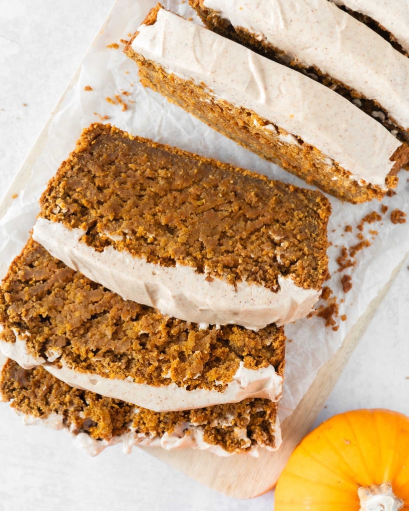 Slices of pumpkin bread on a chopping board