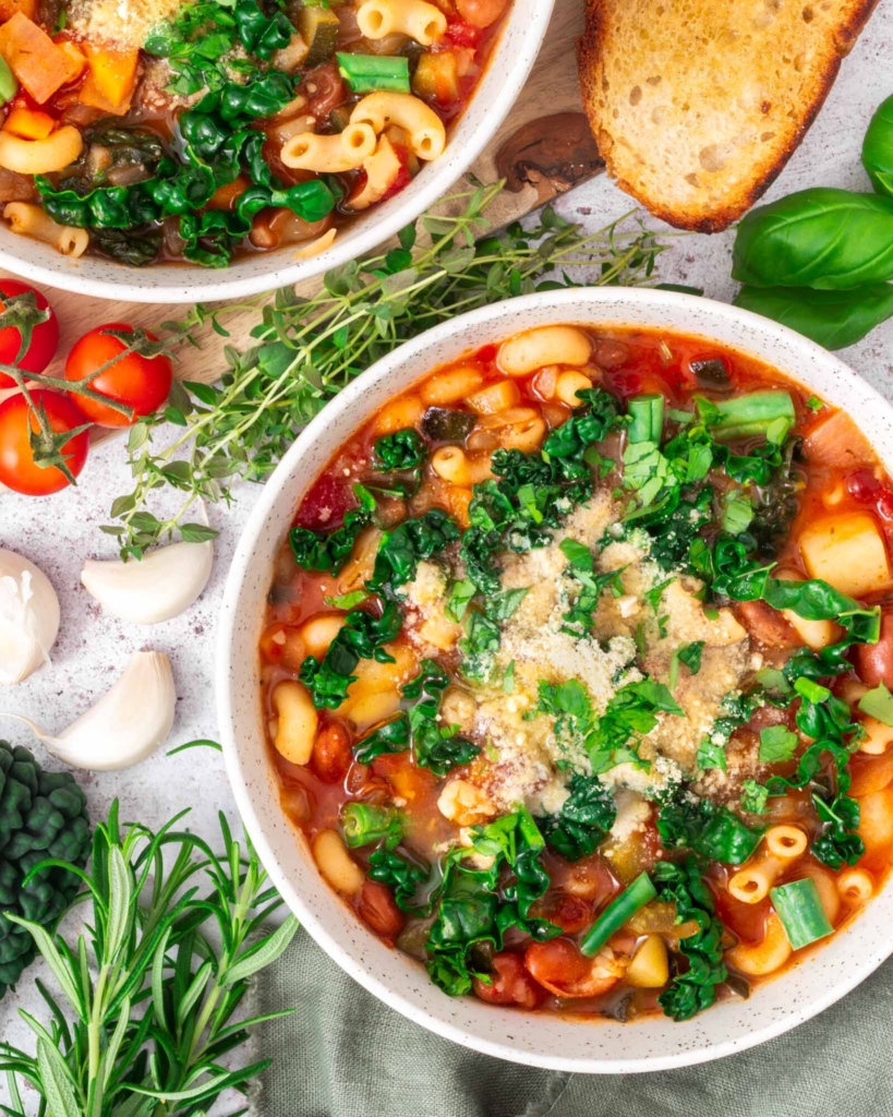 A close up image of a bowl of Italian vegetable soup