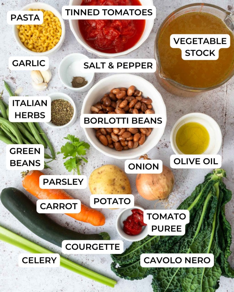 The ingredients needed to make a vegan zuppa del giorno recipe for vegetable, bean and pasta soup