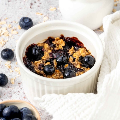 Blueberry vegan baked oatmeal for one in a ramekin