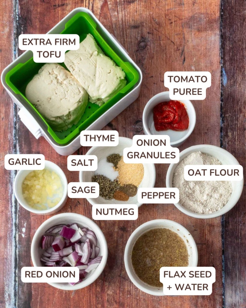 The ingredients needed to a make this tofu sausage recipe, laid out on a wooden table